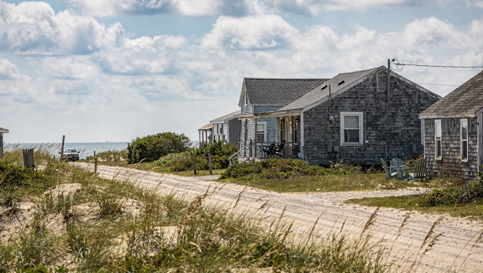 A coastal home with weathered siding near Salisbury Beach in Salisbury, Massachusetts.